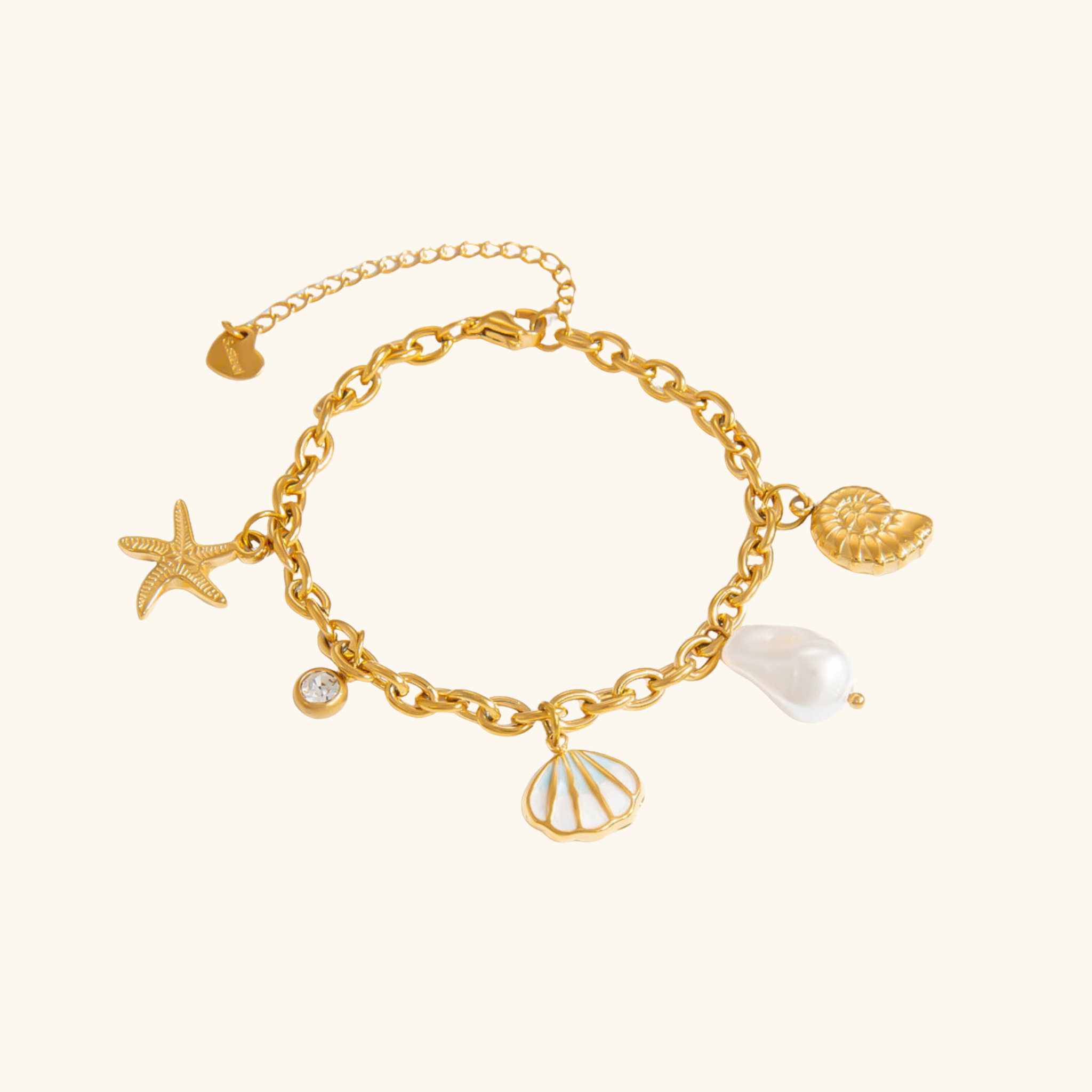 bracelet doré maillon avec pendentifs coquillages et perles