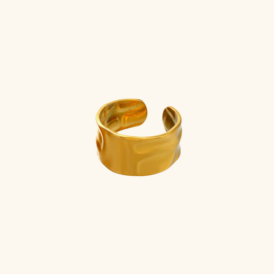 bague onde doree fond uni
